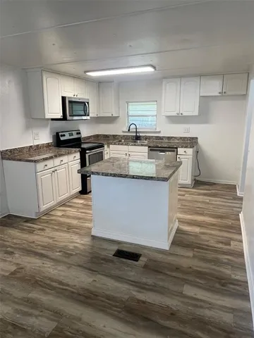 en empty room with window and stairs