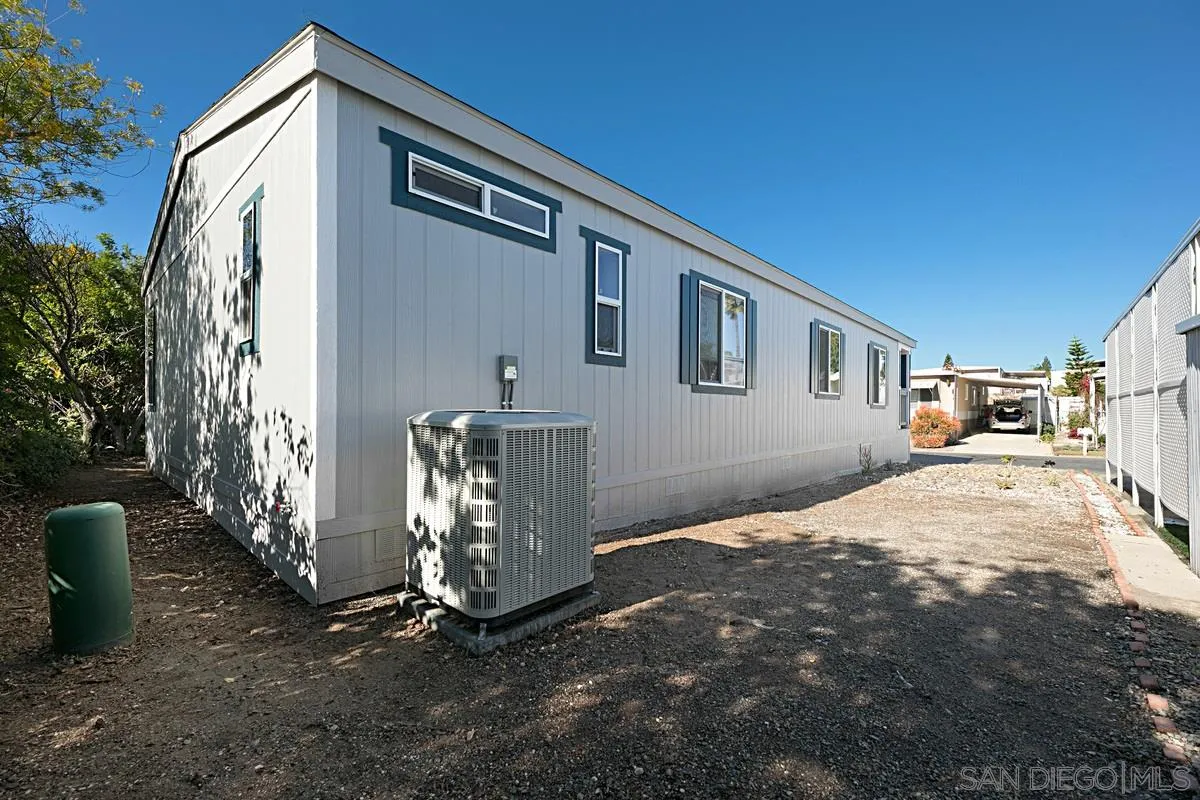 1120 East Mission Road, Unit 7 Fallbrook, CA 92028 - Photo 24 of 24 a view of a house with a yard
