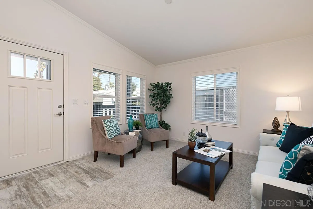 1120 East Mission Road, Unit 7 Fallbrook, CA 92028 - Photo 6 of 24 a living room with furniture and a window