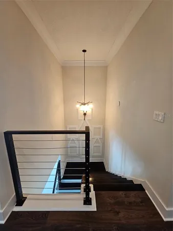 a view of entryway with wooden floor