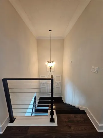 a view of entryway with wooden floor
