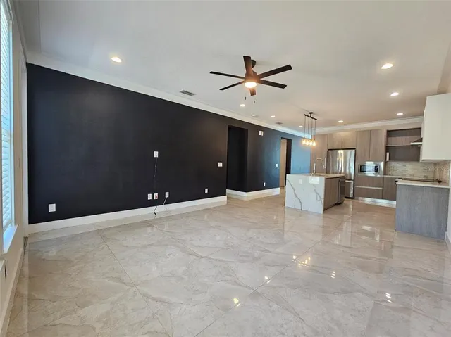 a view of a kitchen with a sink