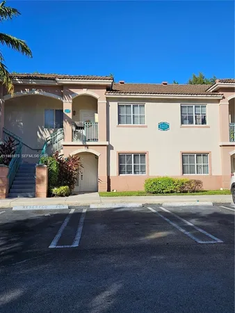 front view of a house with a street