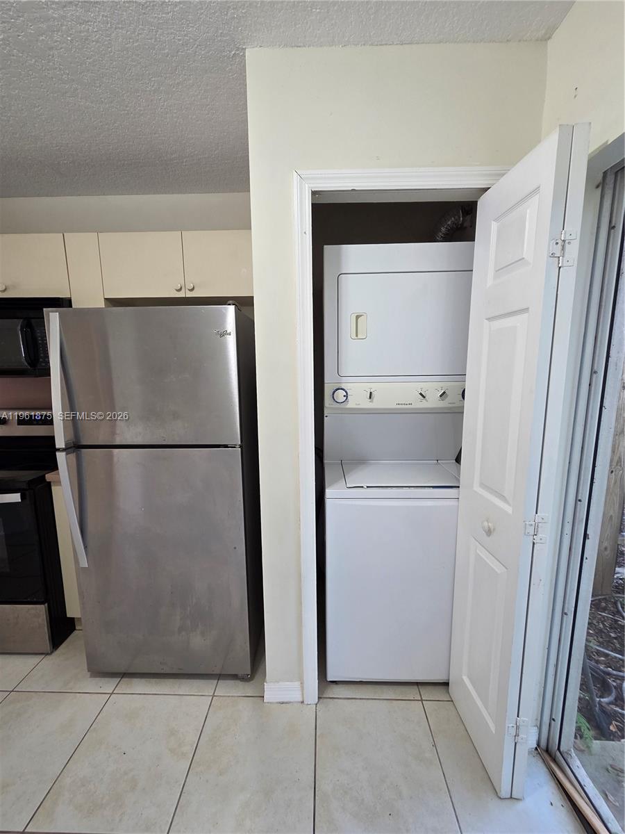 1251 Southeast 29th Street, Unit 10326 Homestead, FL 33035 - Photo 5 of 17 a utility room with cabinets