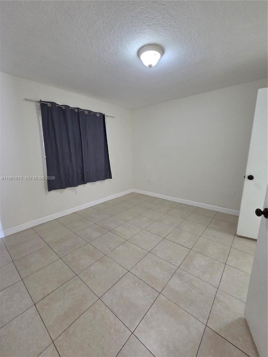 1251 Southeast 29th Street, Unit 10326 Homestead, FL 33035 - Photo 8 of 17 a view of an empty room