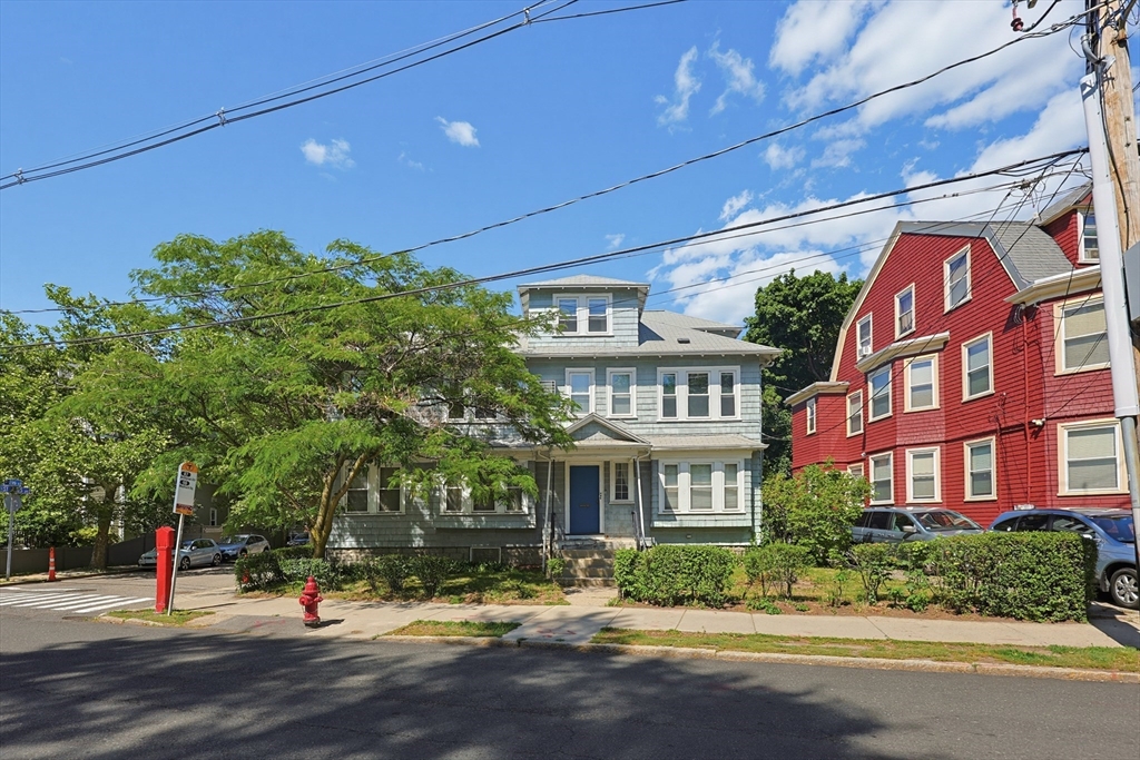 157 Elm Street Somerville, MA 02144 - Photo 19 of 19 a view of a building with a street