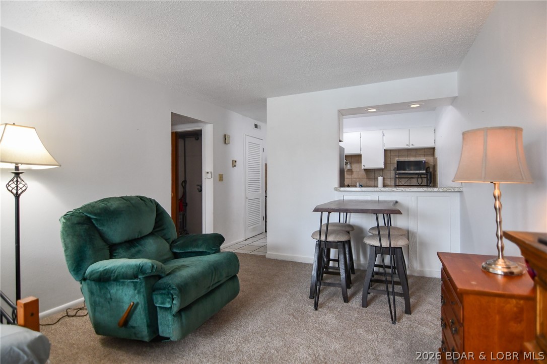 1118 Passover Road, Unit E216 Osage Beach, MO 65065 - Photo 5 of 31 Dining area
