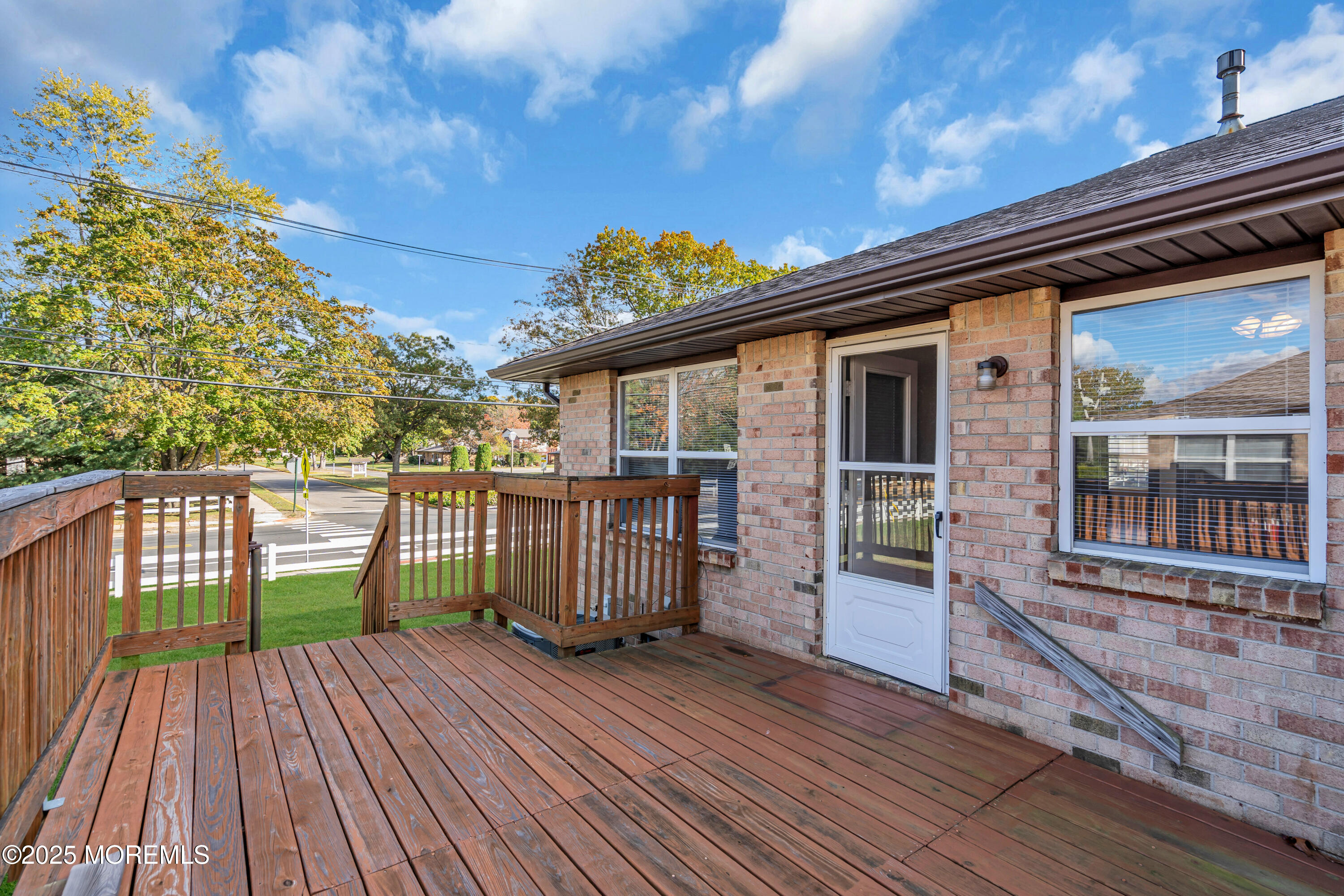 47 Kitty Court Brick, NJ 08724 - Photo 16 of 17 a balcony with wooden floor
