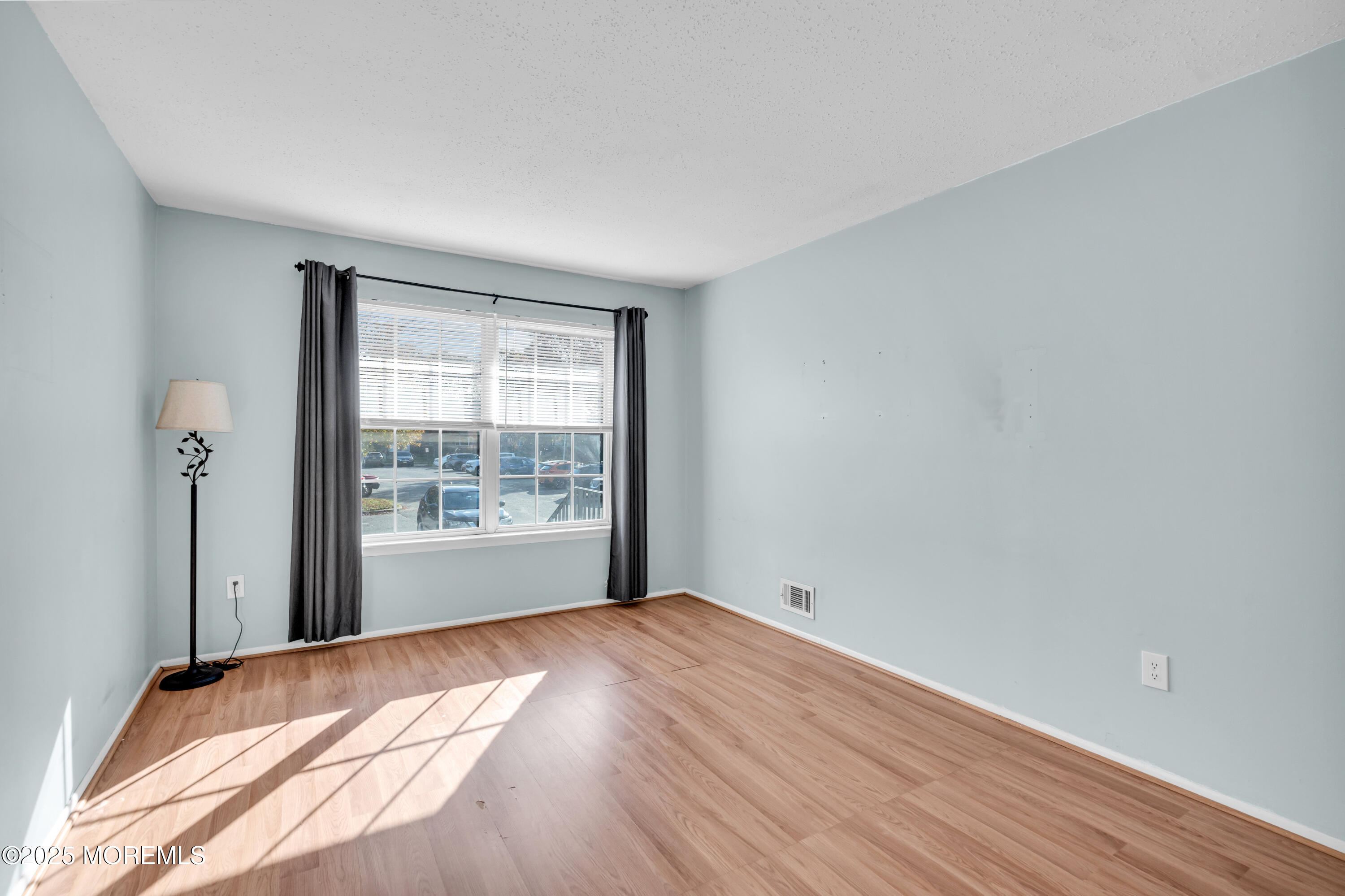 47 Kitty Court Brick, NJ 08724 - Photo 6 of 17 a view of an empty room with a window