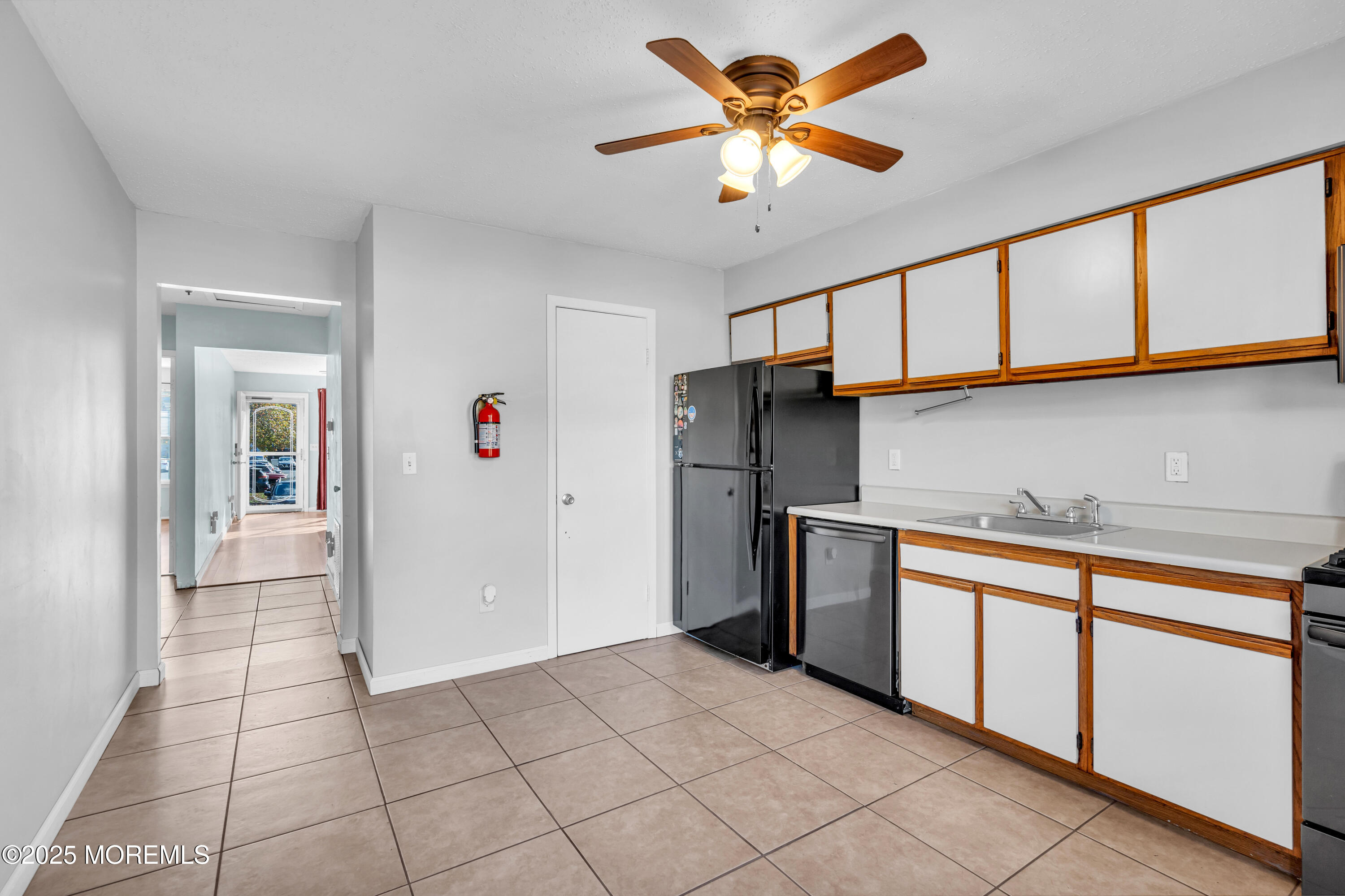 47 Kitty Court Brick, NJ 08724 - Photo 10 of 17 a kitchen with stainless steel appliances granite countertop a refrigerator and a sink