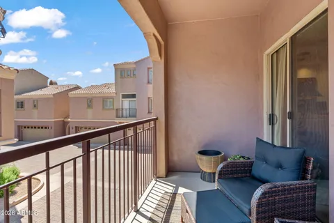 a view of a balcony with couch