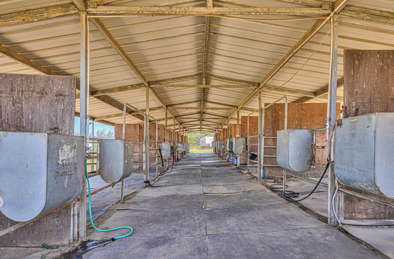 844 River Road Salinas, CA 93908 - Photo 11 of 77 a view of a garage with wooden table and chairs