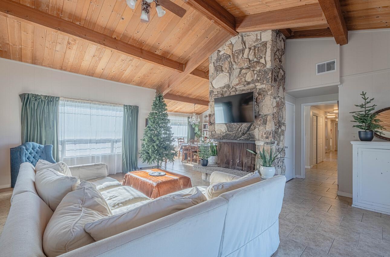 844 River Road Salinas, CA 93908 - Photo 29 of 77 a living room with furniture and a fireplace