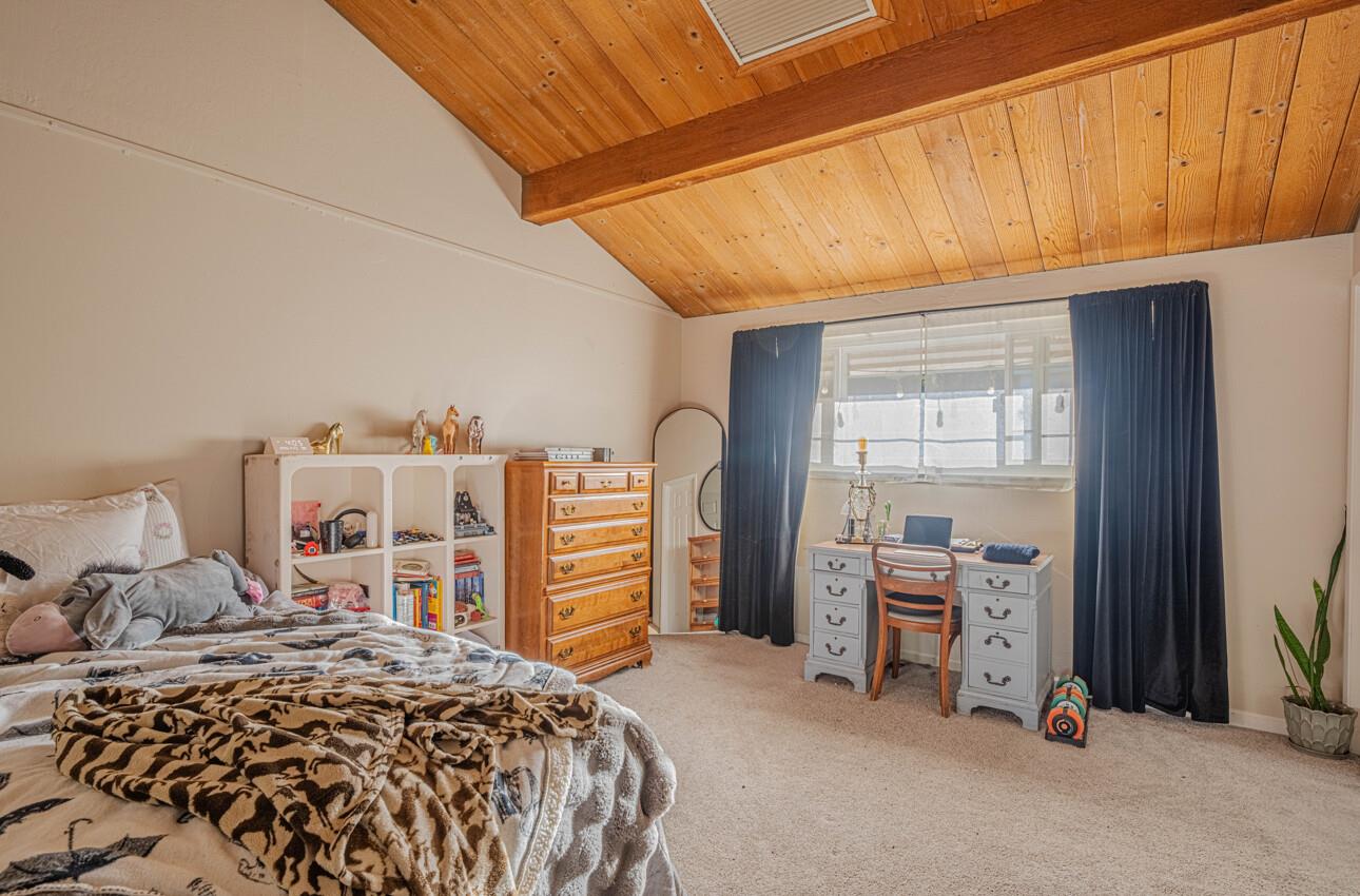 844 River Road Salinas, CA 93908 - Photo 49 of 77 a bedroom with a bed and a window