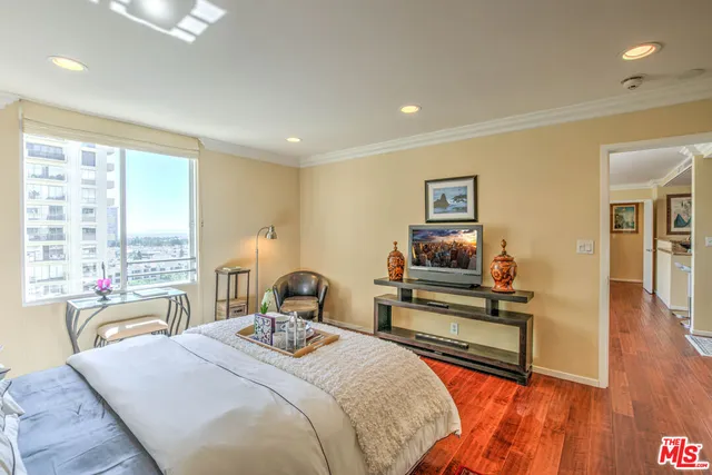 a bedroom with a bed and furniture