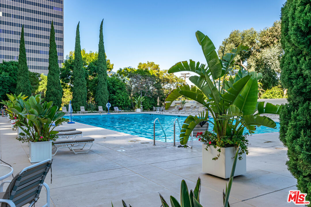 2160 Century Park East, Unit 1607 Los Angeles, CA 90067 - Photo 29 of 38 a potted plant sitting in front of a building