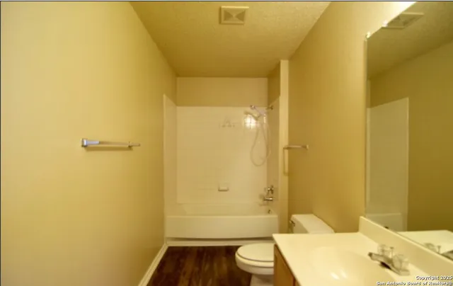 a bathroom with a sink and a bathtub