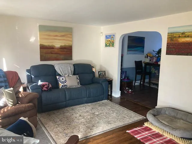 a living room with furniture and a couch