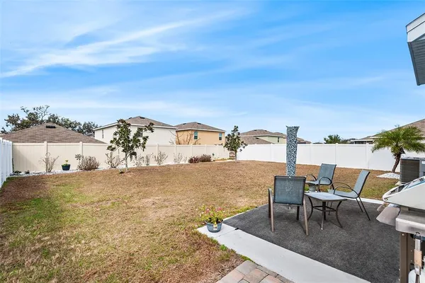 a view of a terrace with chairs