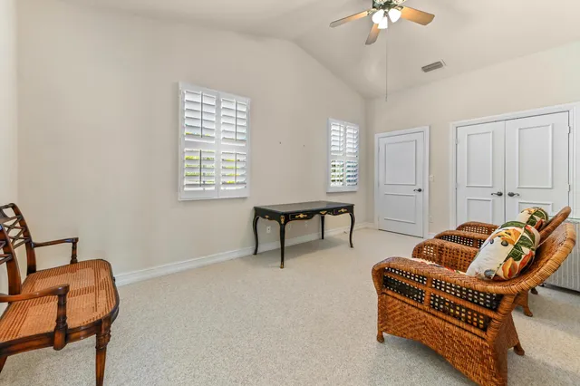 a view of a chairs and tables in the patio