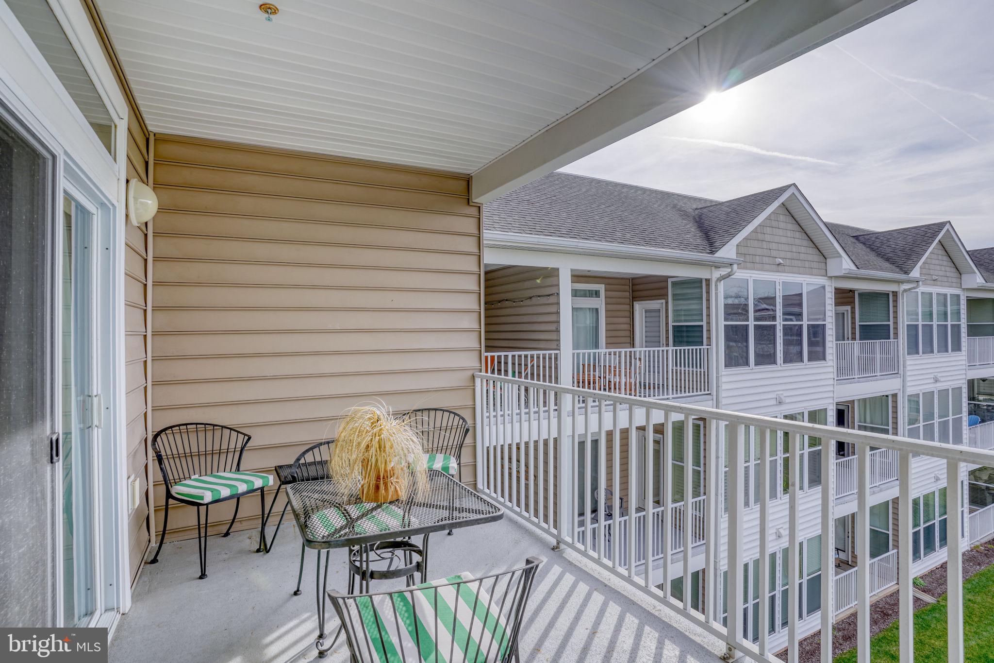 17432 Slipper Shell Way, Unit 22 Lewes, DE 19958 - Photo 30 of 50 DECK OFF OF SUNROOM