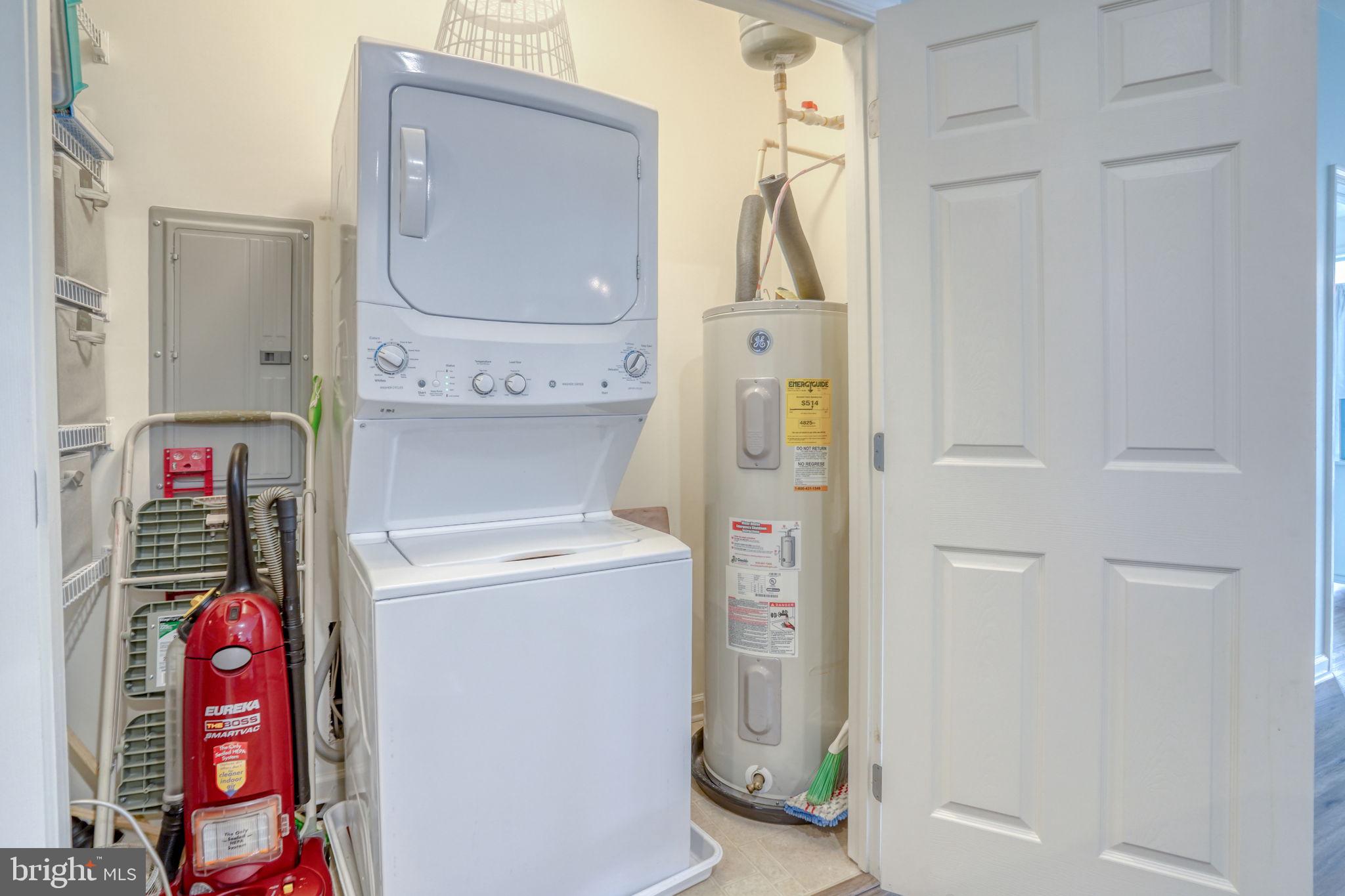 17432 Slipper Shell Way, Unit 22 Lewes, DE 19958 - Photo 40 of 50 PARTIAL VIEW OF LARGE LAUNDRY ROOM