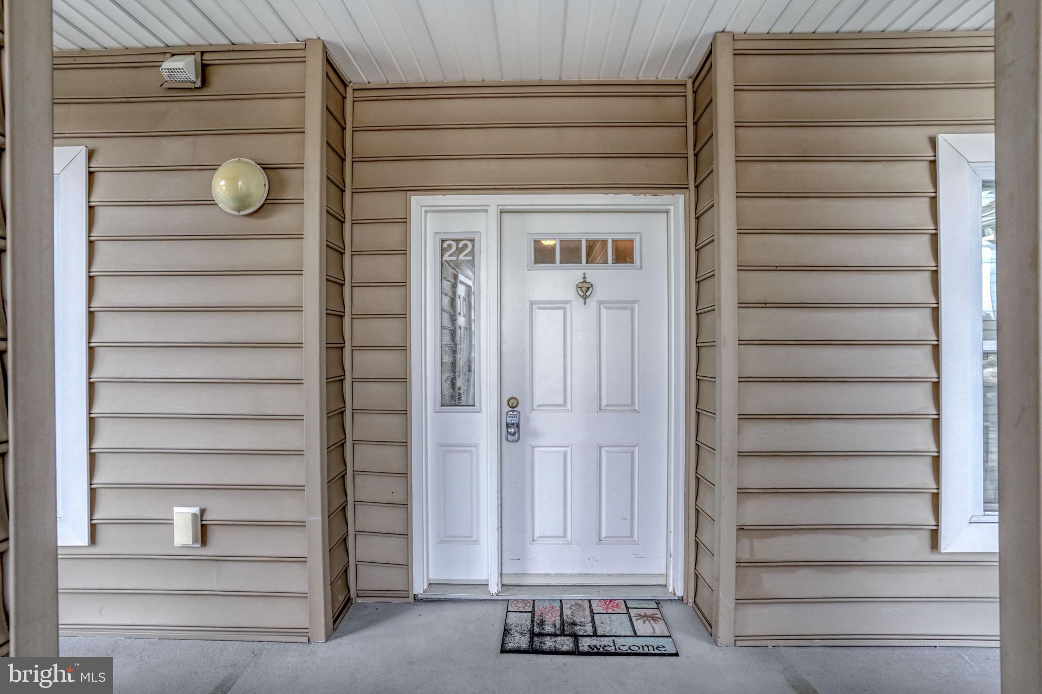 17432 Slipper Shell Way, Unit 22 Lewes, DE 19958 - Photo 6 of 50 YOUR FRONT DOOR WITH ELECTRONIC LOCK