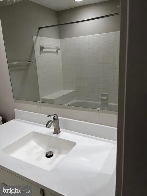 7907 Crows Nest Court, Unit 9342 Laurel, MD 20707 - Photo 3 of 4 a bathroom with a sink and a mirror