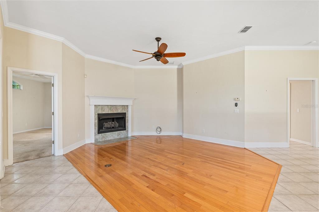 10526 Northwest 32nd Road Gainesville, FL 32606 - Photo 22 of 48 a view of an empty room with a fireplace