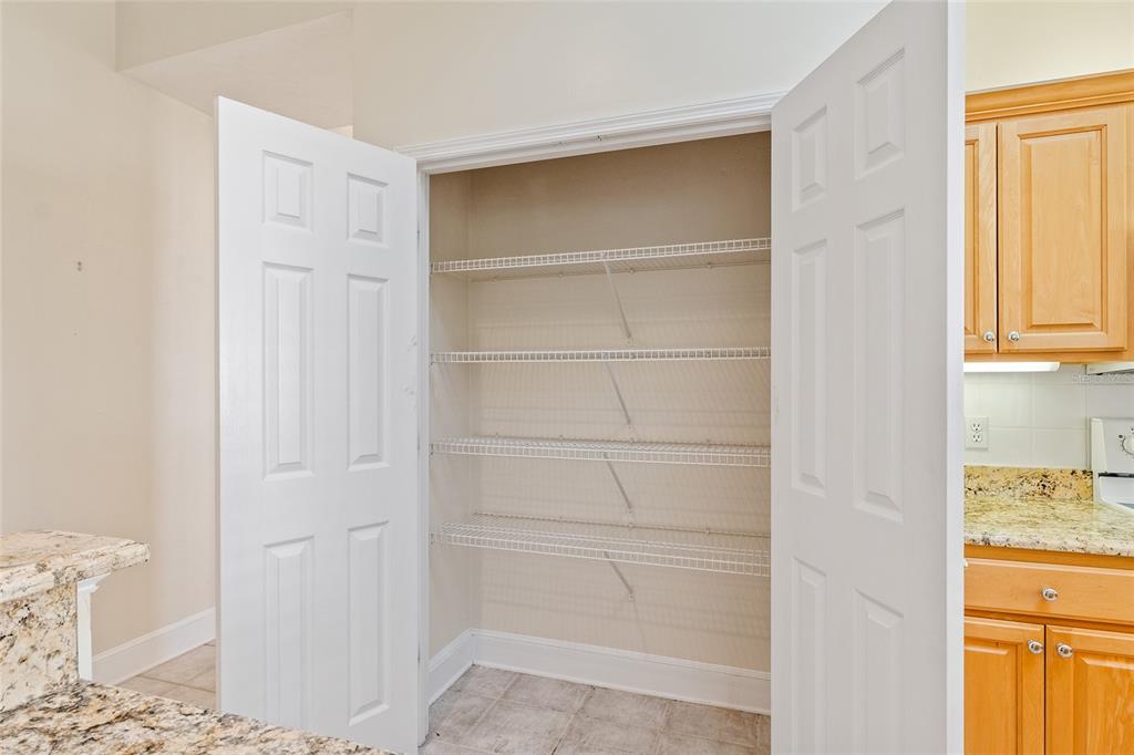 10526 Northwest 32nd Road Gainesville, FL 32606 - Photo 33 of 48 a view of walk in closet with empty racks