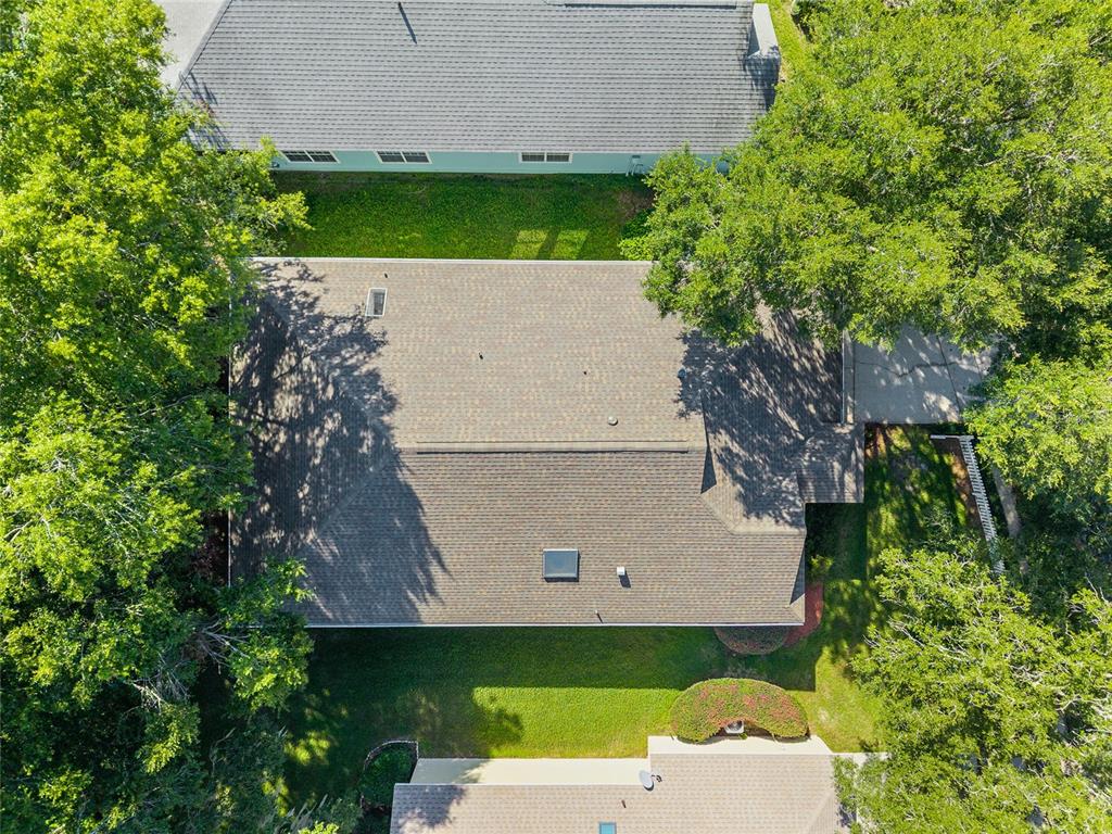 10526 Northwest 32nd Road Gainesville, FL 32606 - Photo 41 of 48 an aerial view of a house with a yard