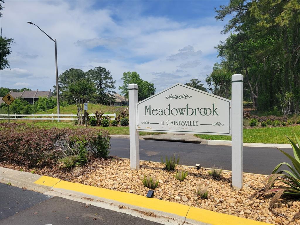 10526 Northwest 32nd Road Gainesville, FL 32606 - Photo 44 of 48 a sign on the side of the road