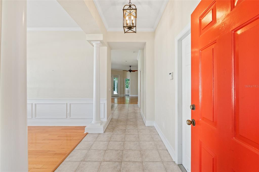 10526 Northwest 32nd Road Gainesville, FL 32606 - Photo 7 of 48 a view of a hallway with wooden shelves