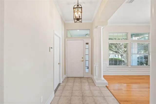 a view of a hallway with windows
