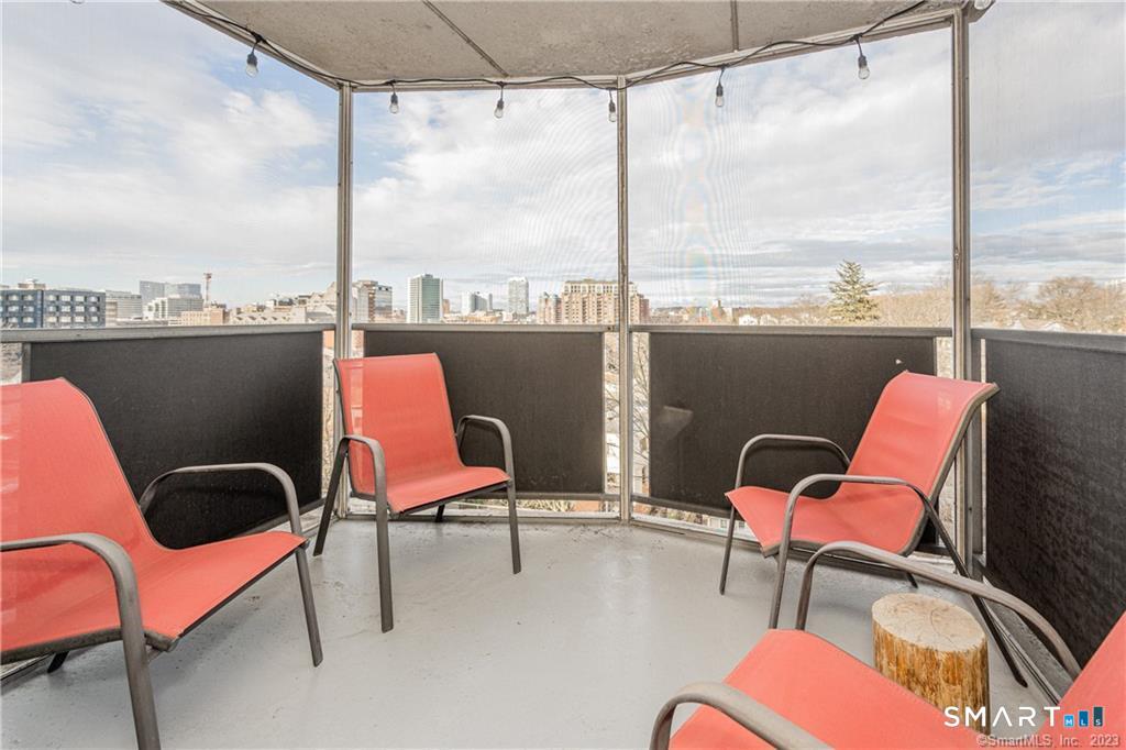 50 Glenbrook Road, Unit 6E Stamford, CT 06902 - Photo 17 of 18 a balcony with furniture