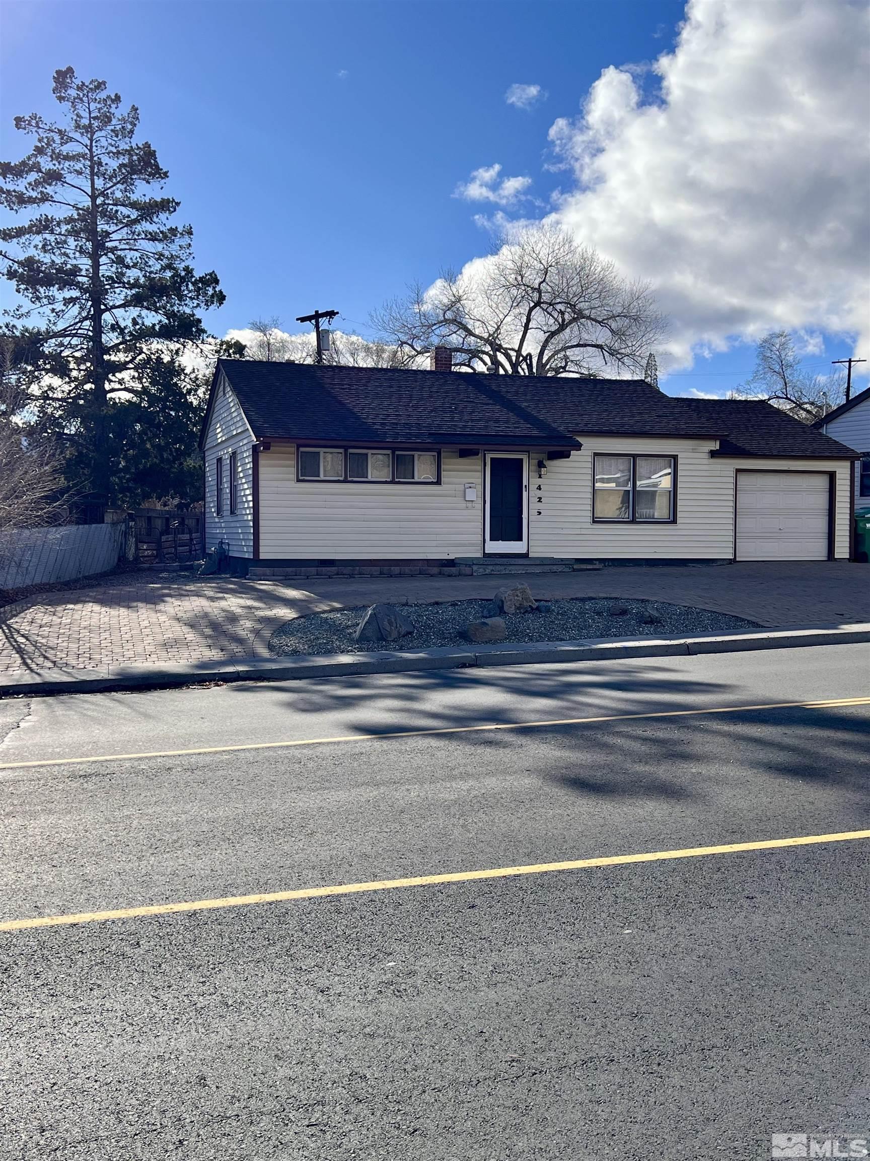 1425 Keystone Avenue Reno, NV 89503 - Photo 1 of 12 a view of house with mountain view