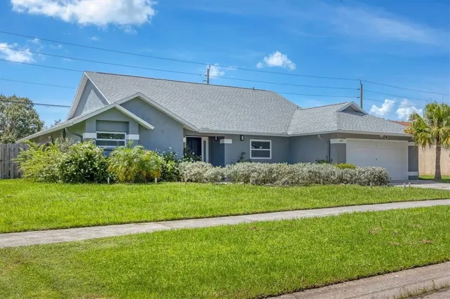 a house view with a garden space