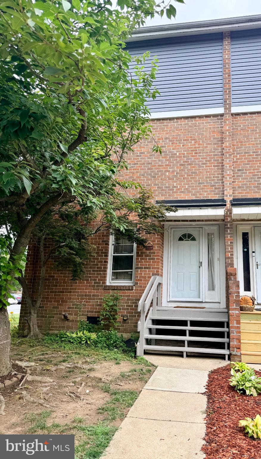 9338 Canterbury Riding, Unit 9 Laurel, MD 20723 - Photo 1 of 1 Charming brick townhouse entrance.