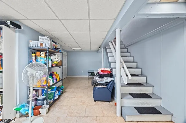 a view of entryway with stairs and furniture