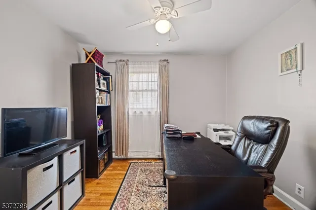 a view of a back yard with a table and chair