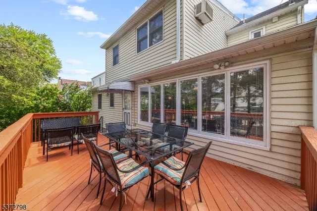 an aerial view of multiple houses with outdoor space