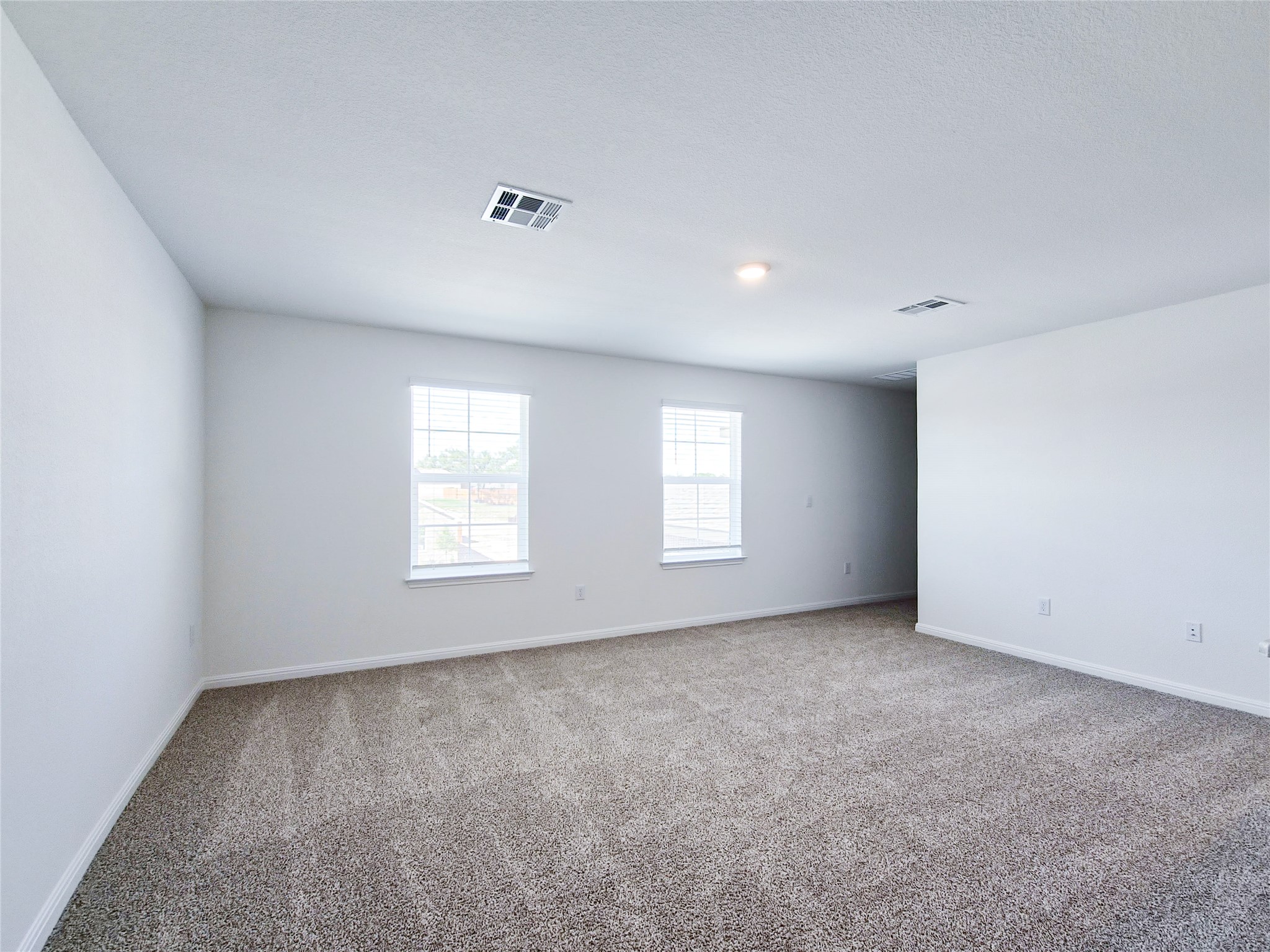 2313 March Hare Trace Leander, TX 78641 - Photo 25 of 30 Unfurnished room with carpet flooring and baseboards