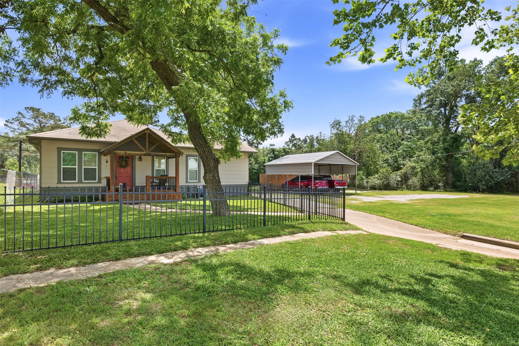 1726 13th Street Hempstead, TX 77445 - Photo 1 of 40 a view of a house with a yard and sitting area