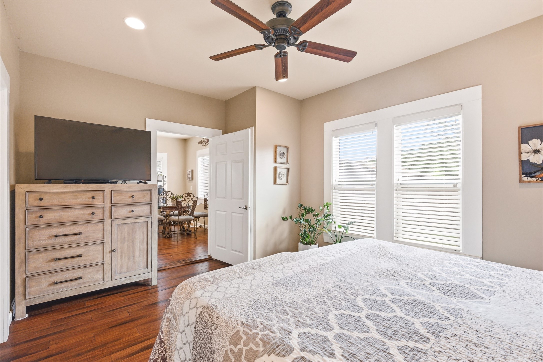 1726 13th Street Hempstead, TX 77445 - Photo 12 of 40 a bedroom with a bed and a flat screen tv