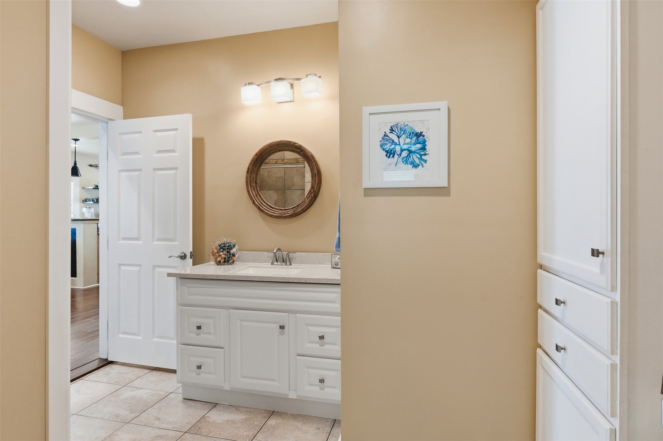 1726 13th Street Hempstead, TX 77445 - Photo 19 of 40 a bathroom with a toilet a sink and a mirror