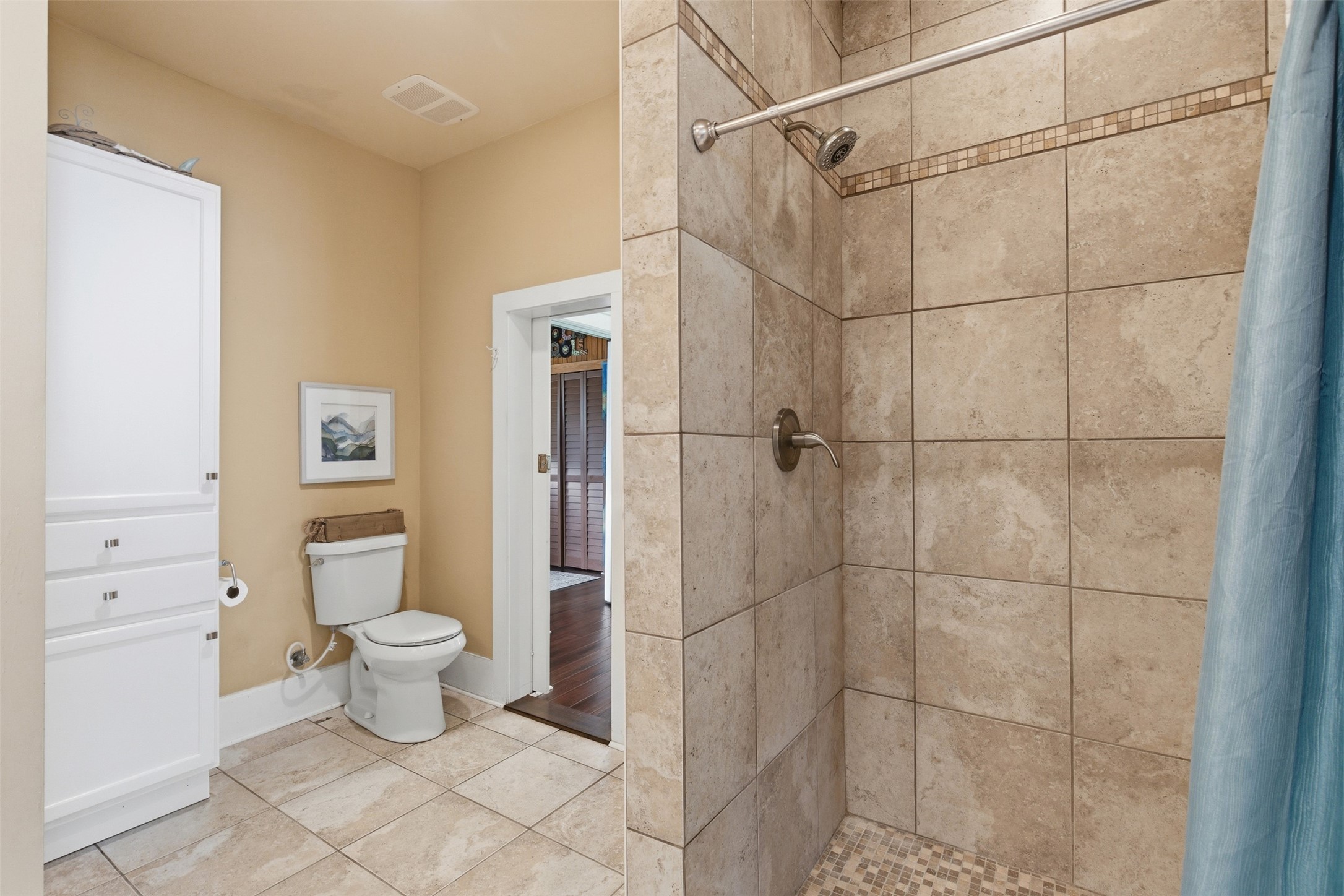 1726 13th Street Hempstead, TX 77445 - Photo 20 of 40 a bathroom with a toilet and a shower
