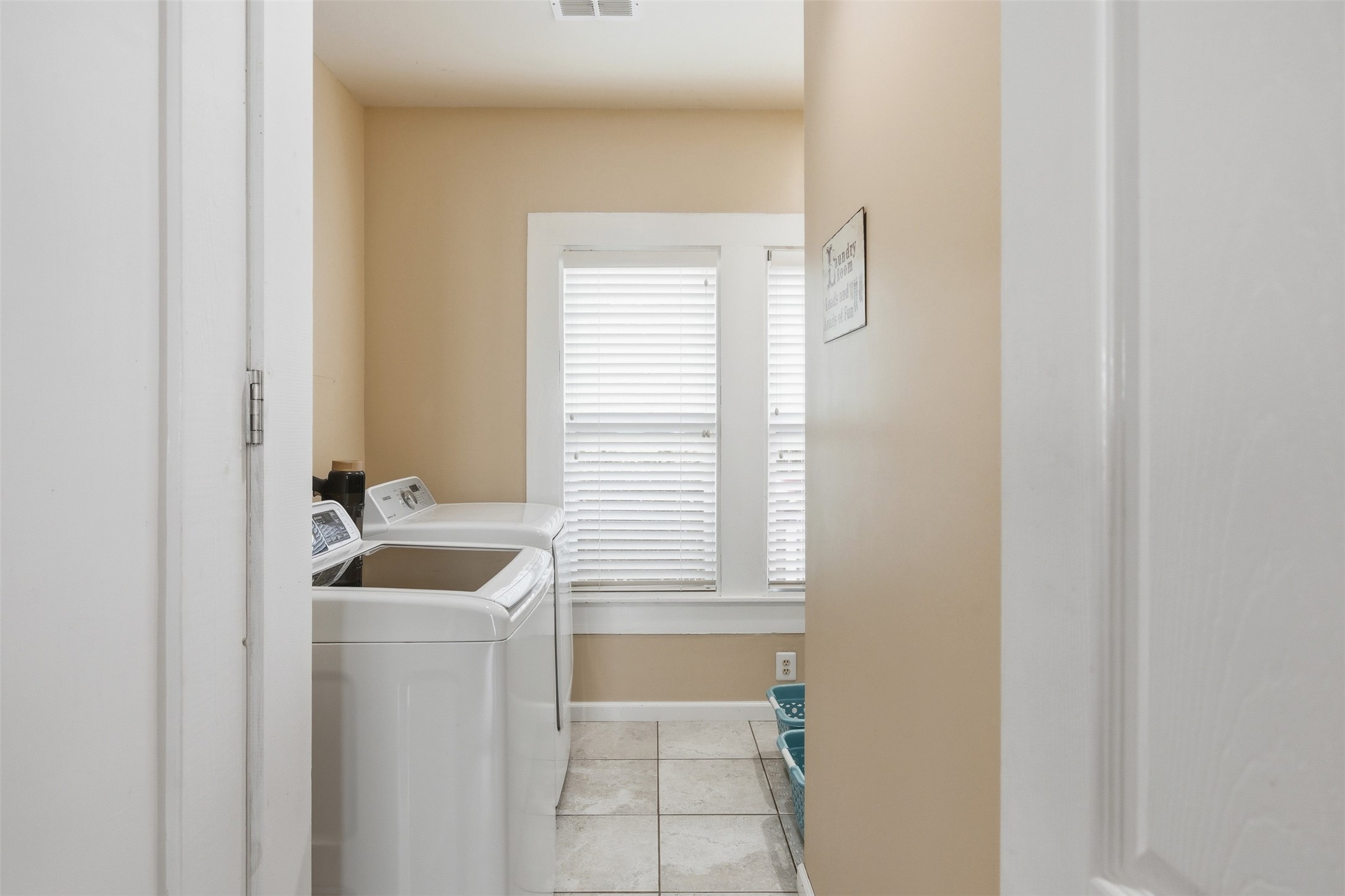 1726 13th Street Hempstead, TX 77445 - Photo 21 of 40 a bathroom with a sink and a bathtub