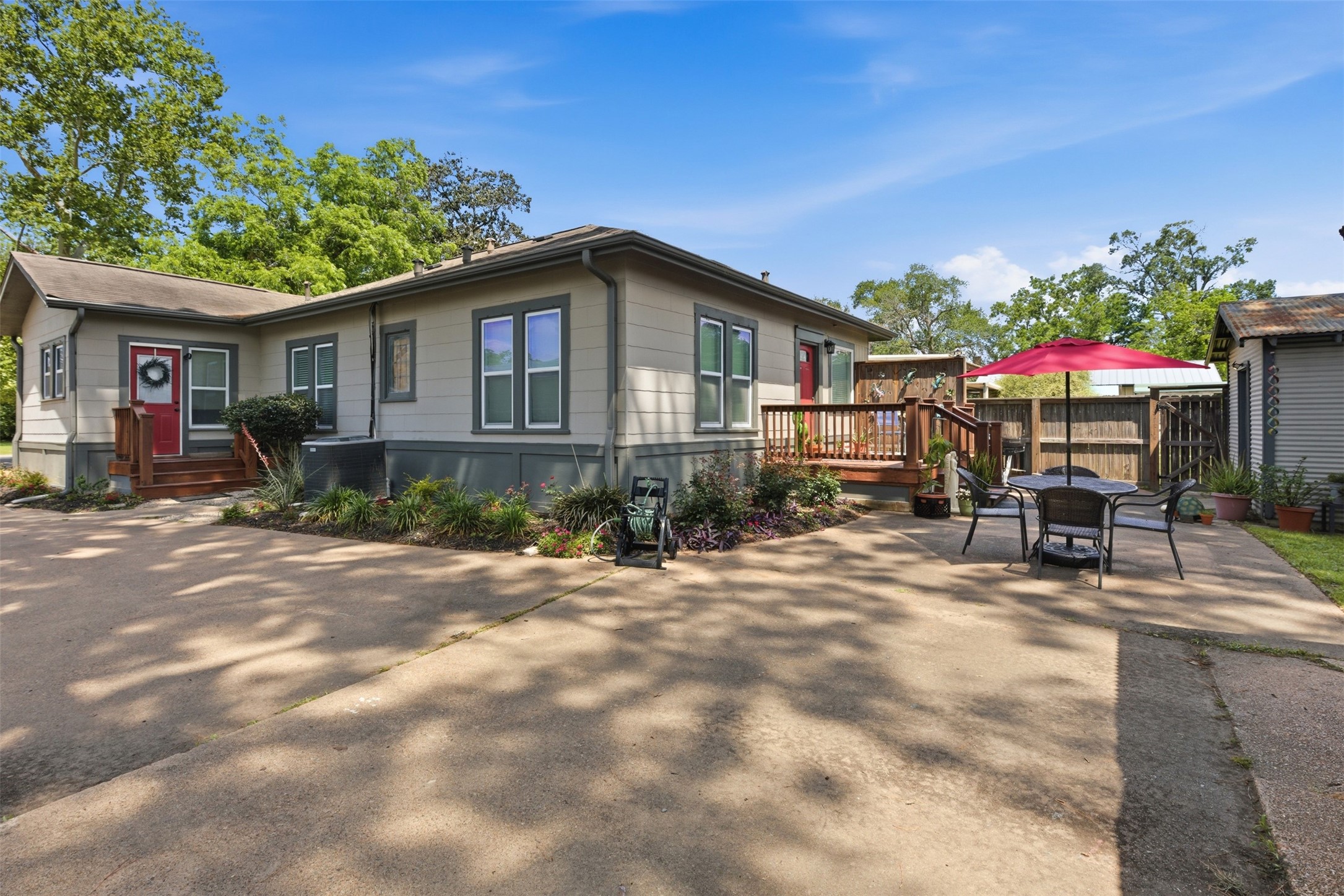 1726 13th Street Hempstead, TX 77445 - Photo 25 of 40 a view of a house with backyard and sitting area
