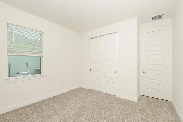 a bathroom with a bathtub and a sink