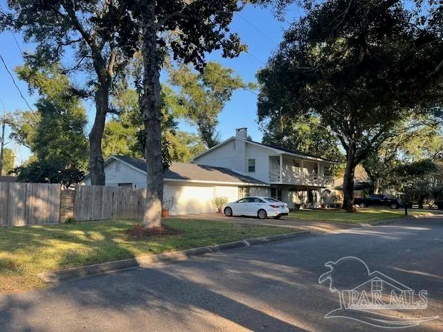 a kitchen with stainless steel appliances a stove a sink and a refrigerator